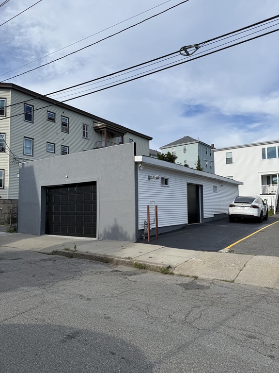 430 Alden Street Fall River, MA 02723 - Photo 1 of 13 a view of a car garage