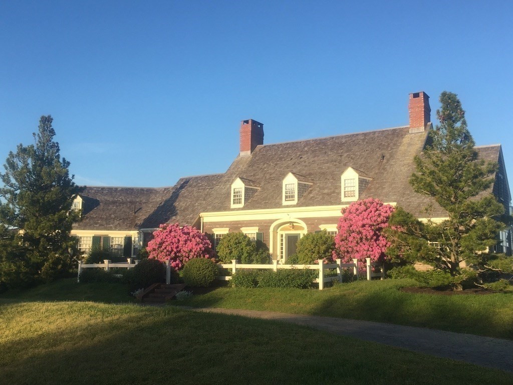 504 Old Harbor Road Chatham, MA 02633 - Photo 2 of 42 a front view of a house with a yard