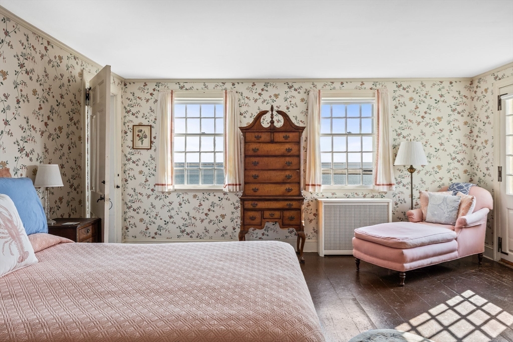 504 Old Harbor Road Chatham, MA 02633 - Photo 27 of 42 a bedroom with a bed and a couch