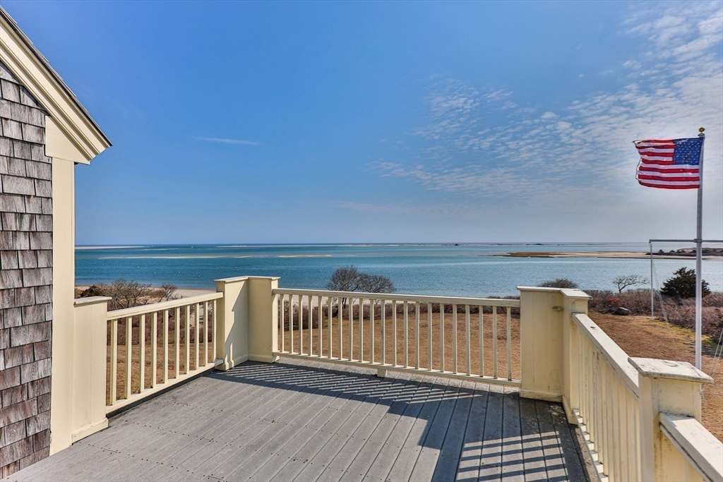 504 Old Harbor Road Chatham, MA 02633 - Photo 29 of 42 a view of a balcony with wooden floor