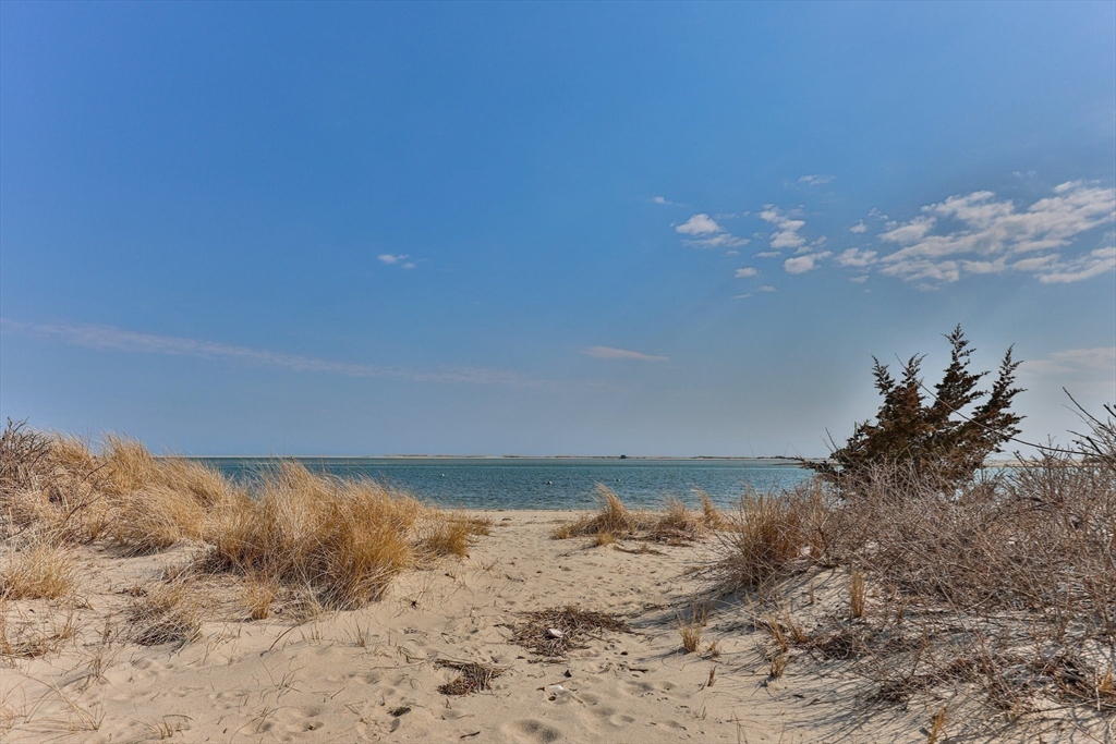 504 Old Harbor Road Chatham, MA 02633 - Photo 36 of 42 a view of water and mountain in the background