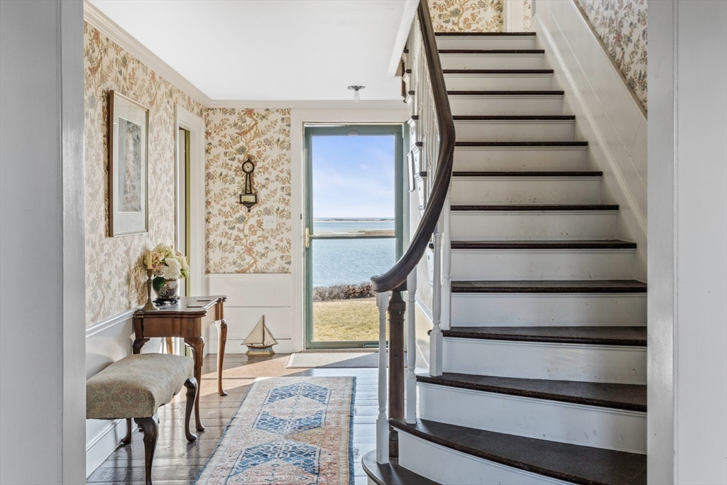 504 Old Harbor Road Chatham, MA 02633 - Photo 8 of 42 a view of entryway with stairs and furniture