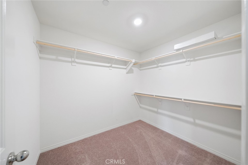 41979 Rondo Street, Unit 1106 Murrieta, CA 92562 - Photo 12 of 18 a view of an empty walk in closet