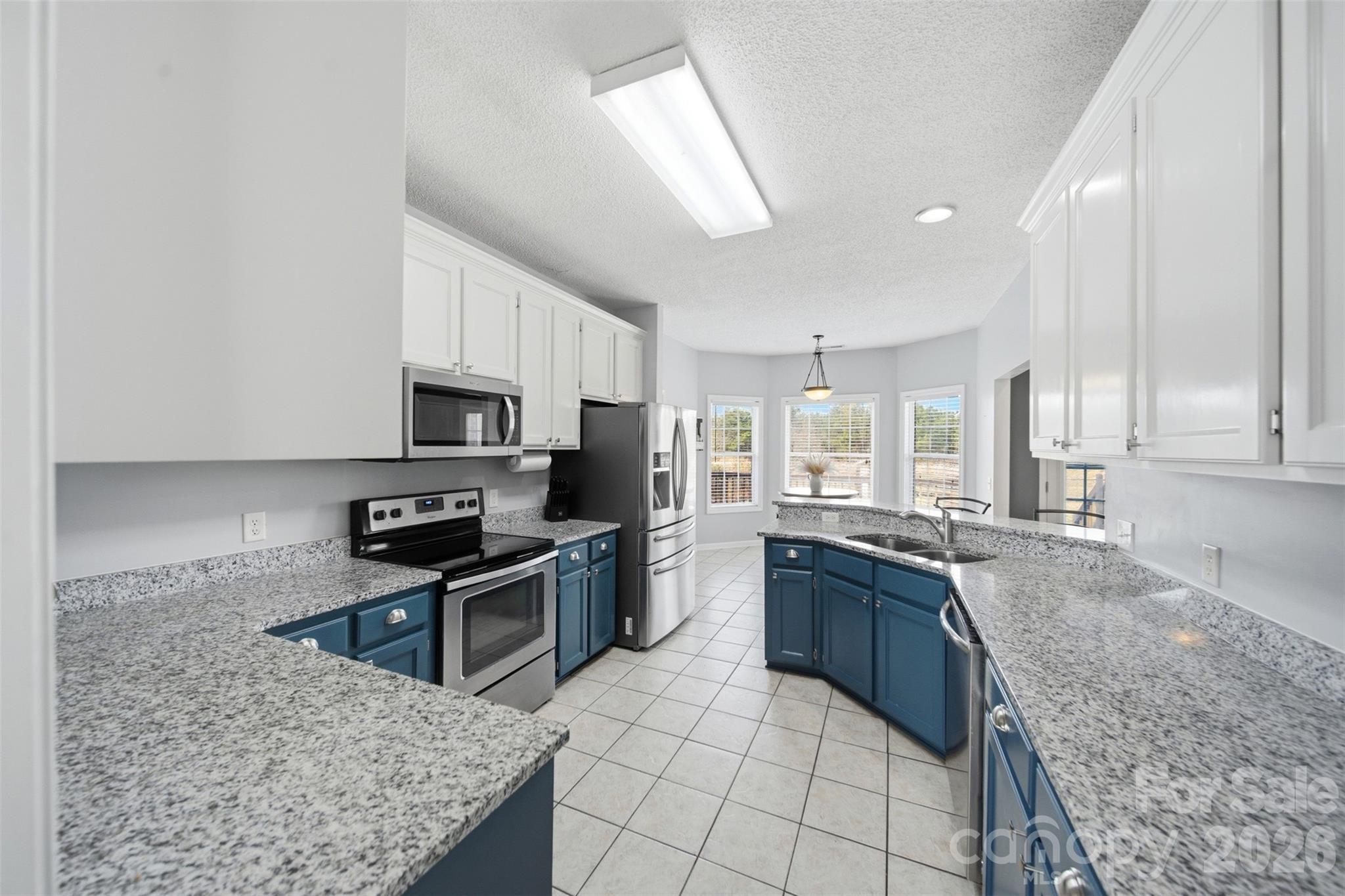 2535 Citrus Lane Sumter, SC 29153 - Photo 15 of 47 a kitchen with stainless steel appliances granite countertop a sink stove and refrigerator