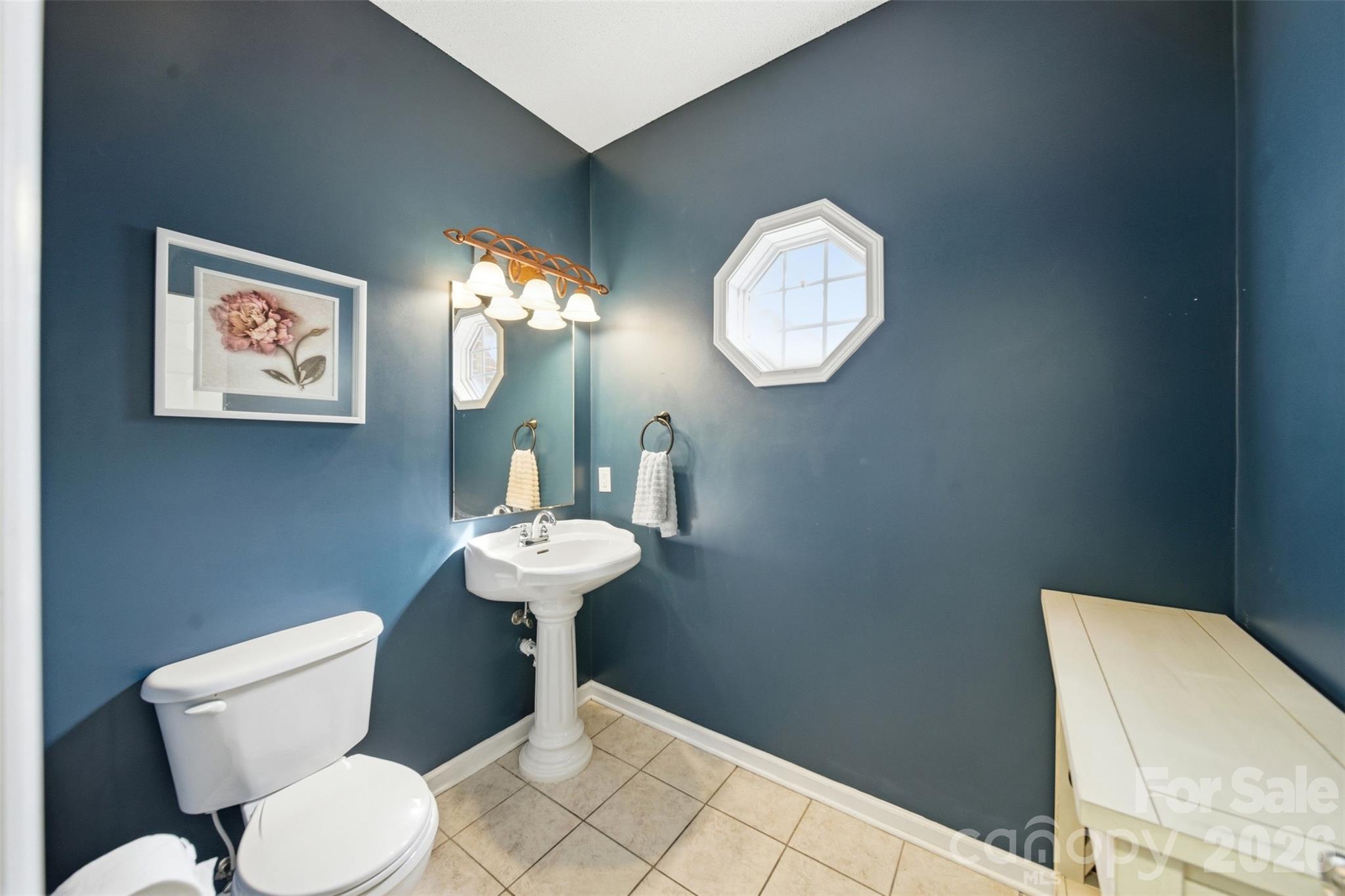 2535 Citrus Lane Sumter, SC 29153 - Photo 18 of 47 a bathroom with a toilet sink and mirror