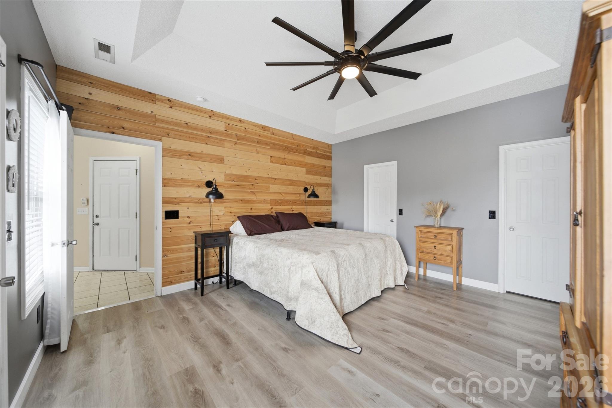 2535 Citrus Lane Sumter, SC 29153 - Photo 20 of 47 a bedroom with a bed and a chandelier