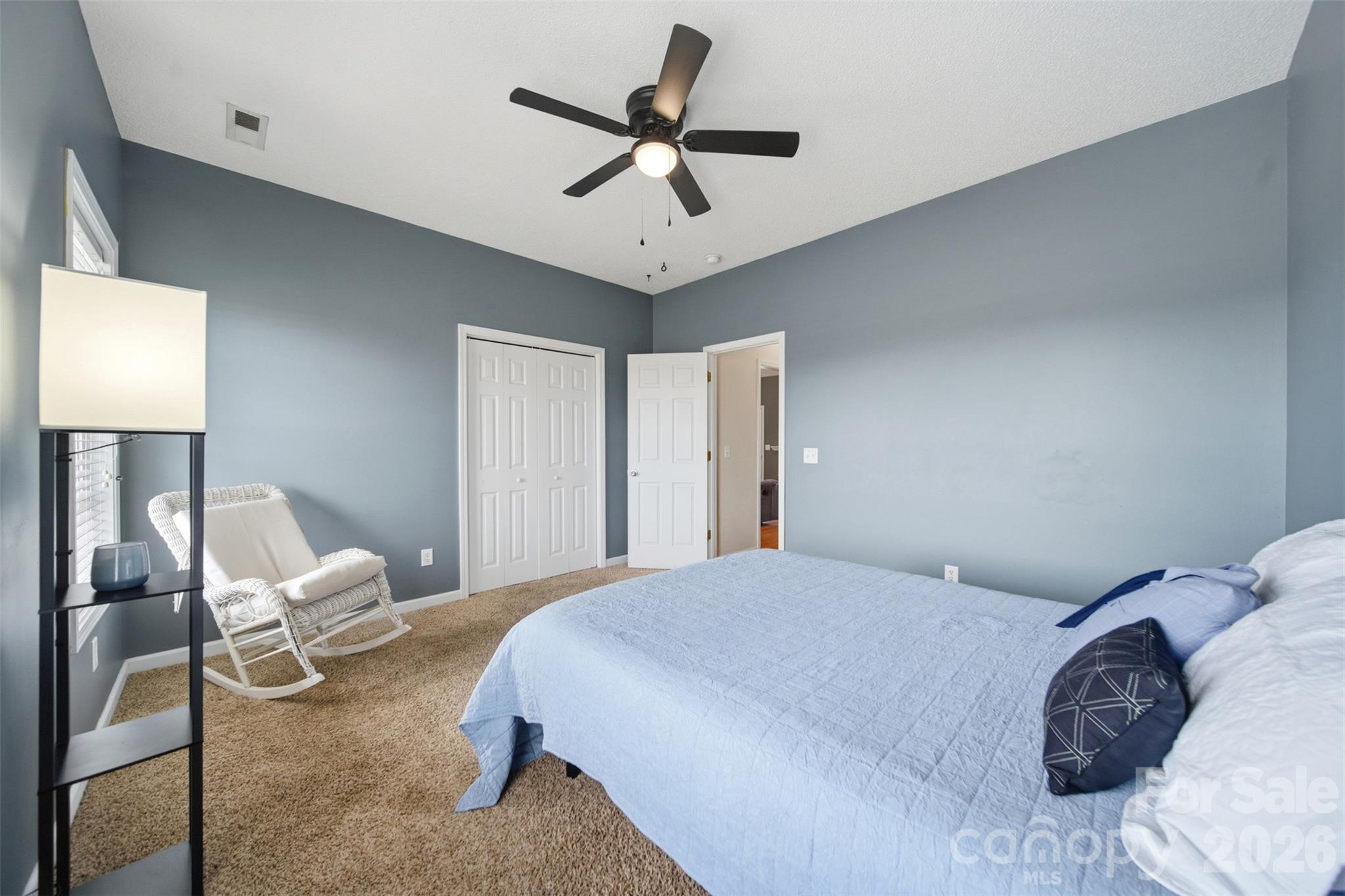 2535 Citrus Lane Sumter, SC 29153 - Photo 26 of 47 a bedroom with a bed and a chandelier