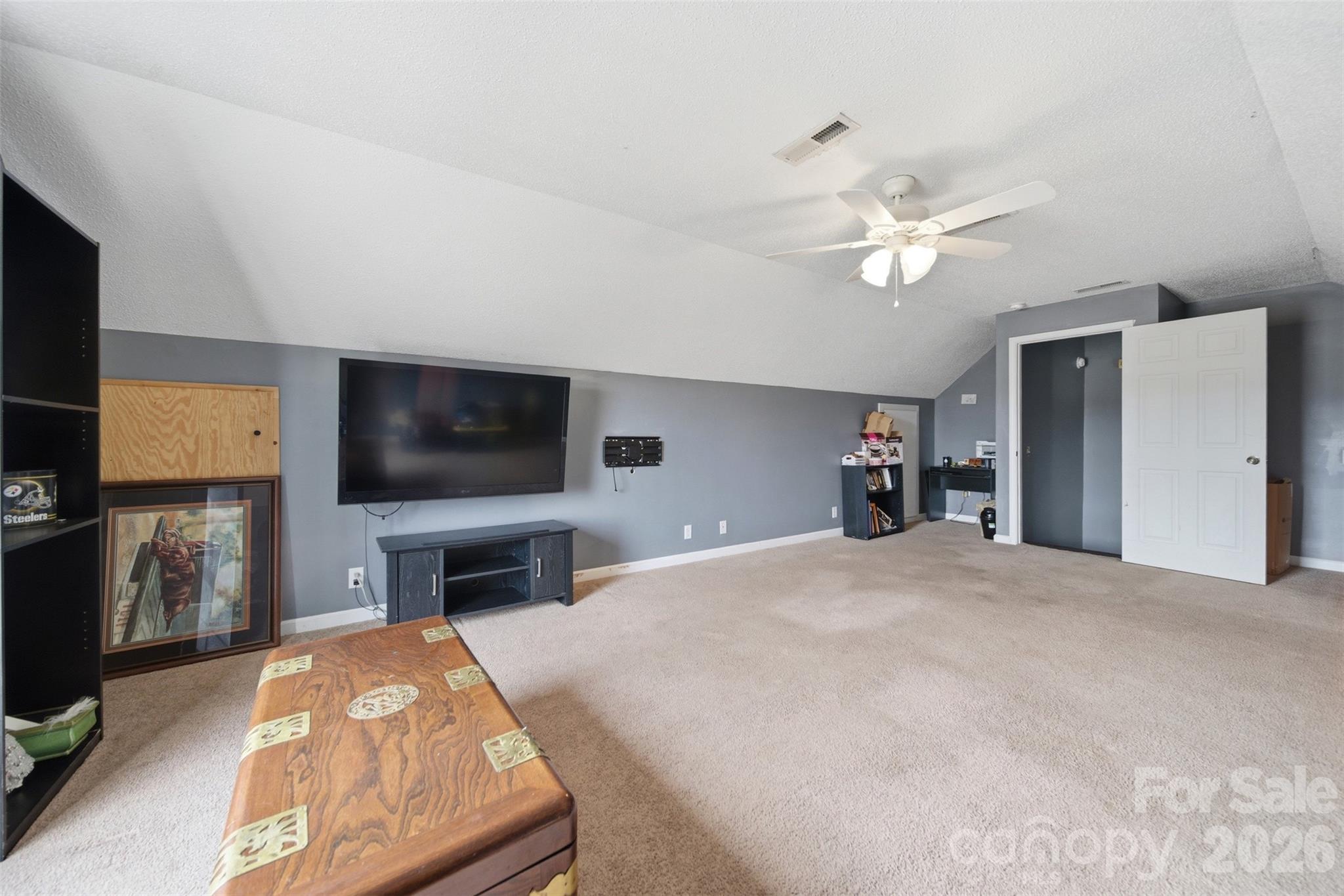 2535 Citrus Lane Sumter, SC 29153 - Photo 33 of 47 a spacious bedroom with a bed and a flat screen tv