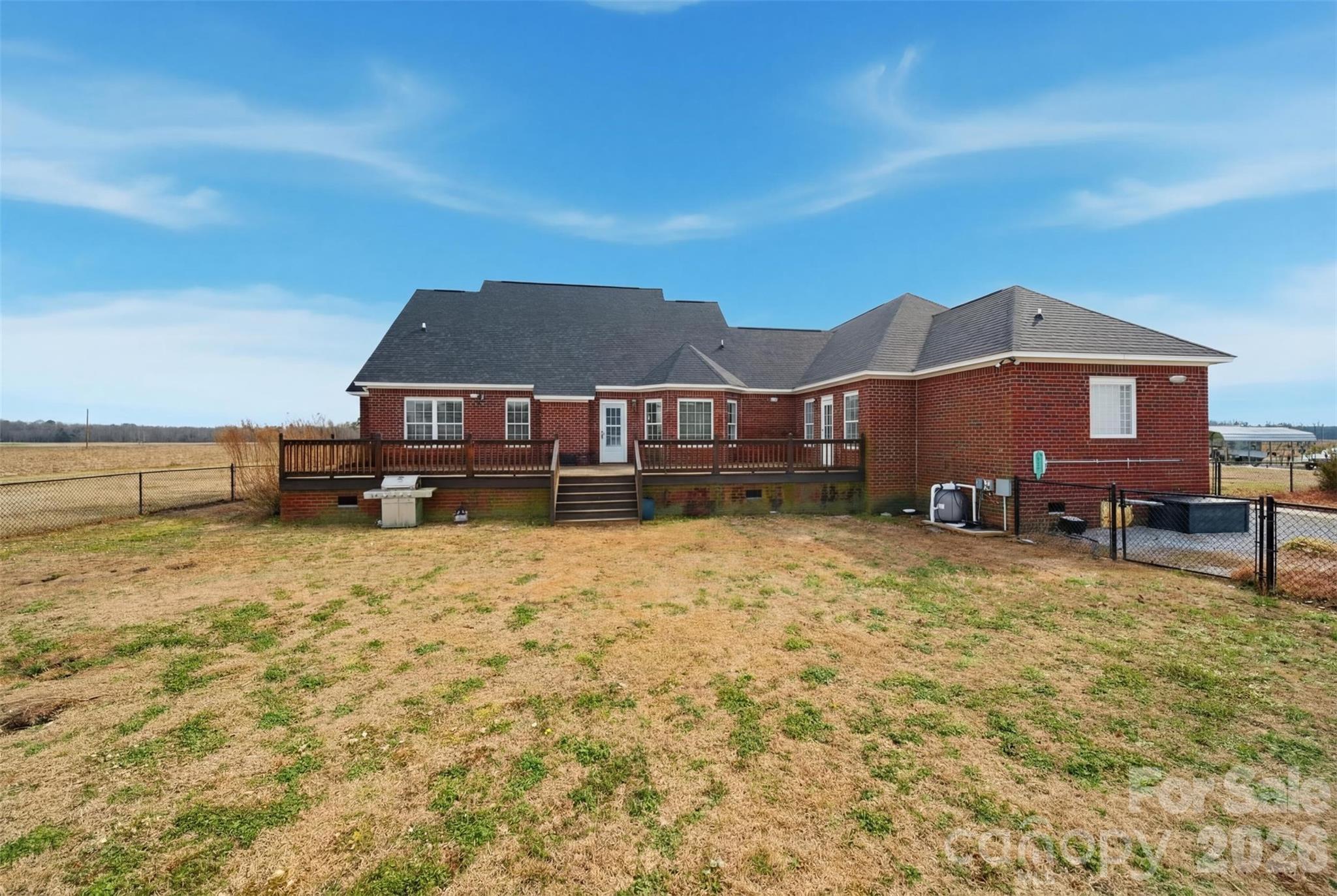 2535 Citrus Lane Sumter, SC 29153 - Photo 36 of 47 a house with a field in front of it