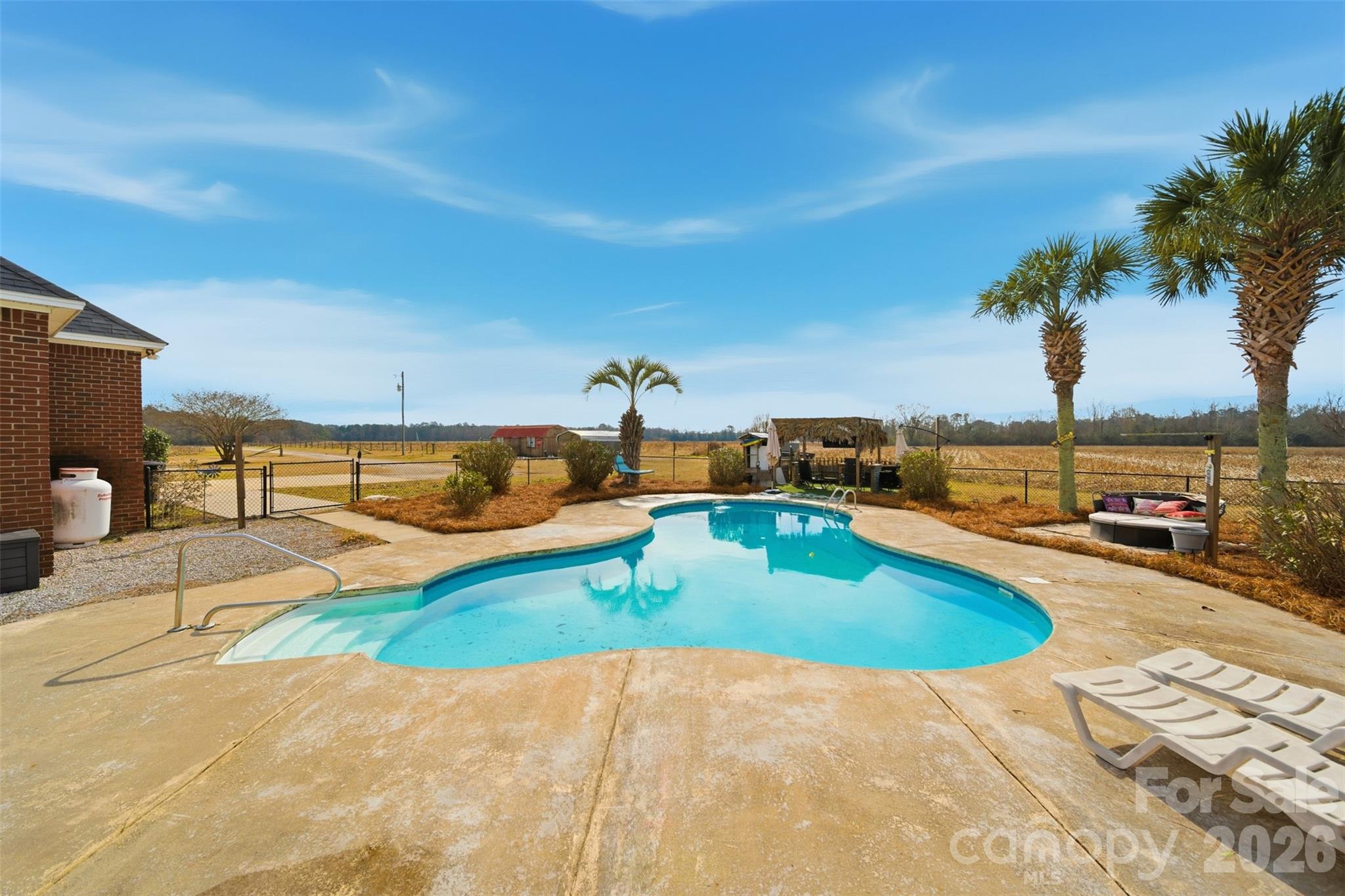 2535 Citrus Lane Sumter, SC 29153 - Photo 37 of 47 a view of a swimming pool with a lounge chair