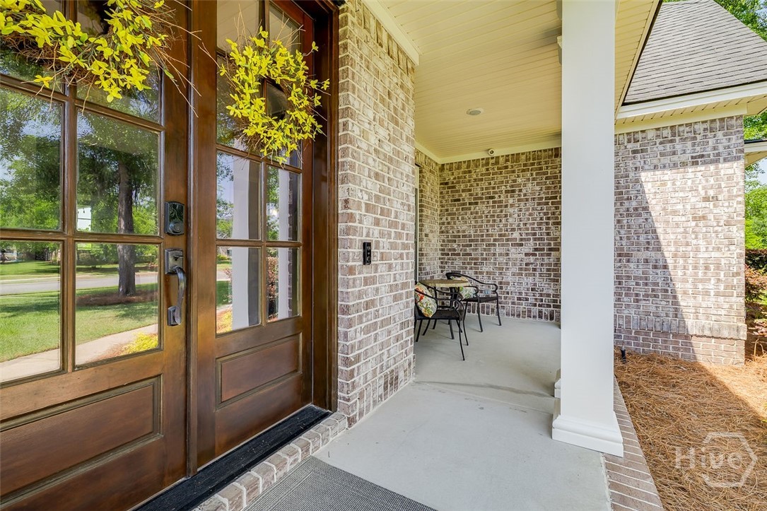 7 Reed Grass Lane Savannah, GA 31405 - Photo 4 of 70 Nice large front porch. Great for holiday decorating or anticipating guests arrival.