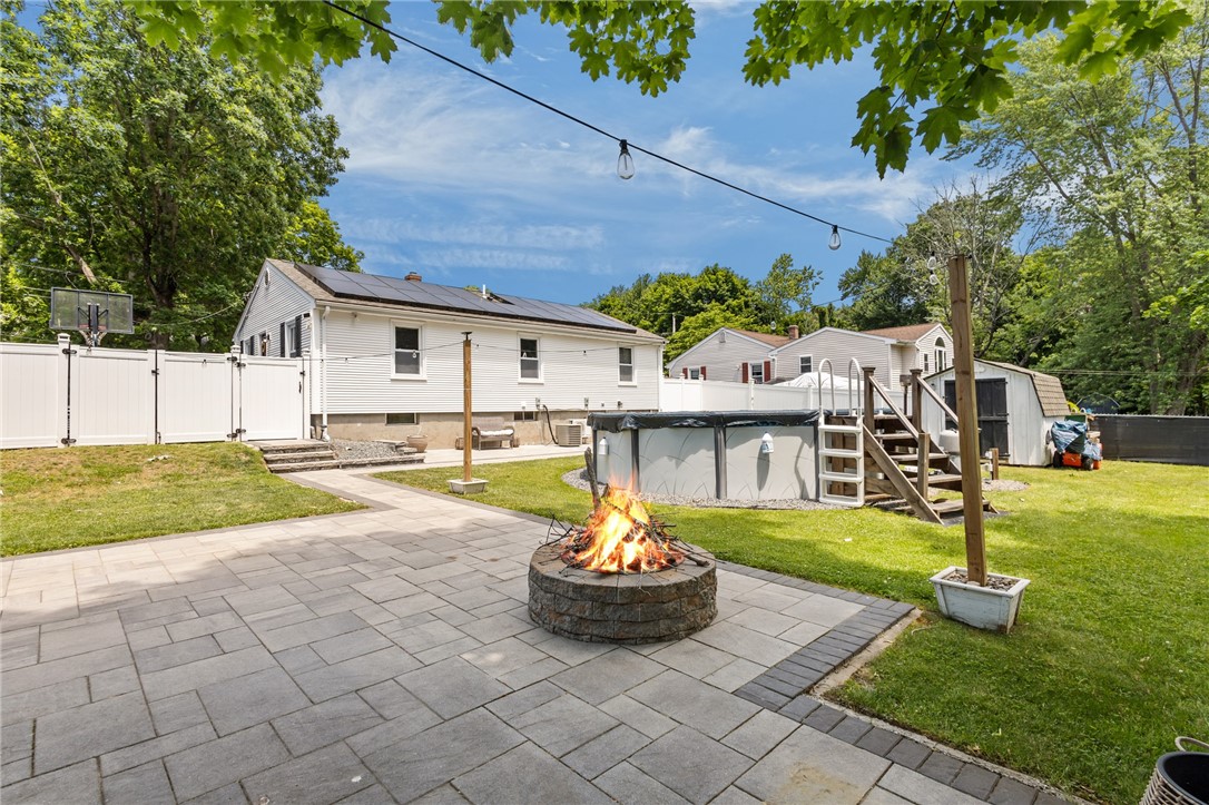 33 Fairhaven Road Cumberland, RI 02864 - Photo 31 of 36 Paver patio, firepit, pool