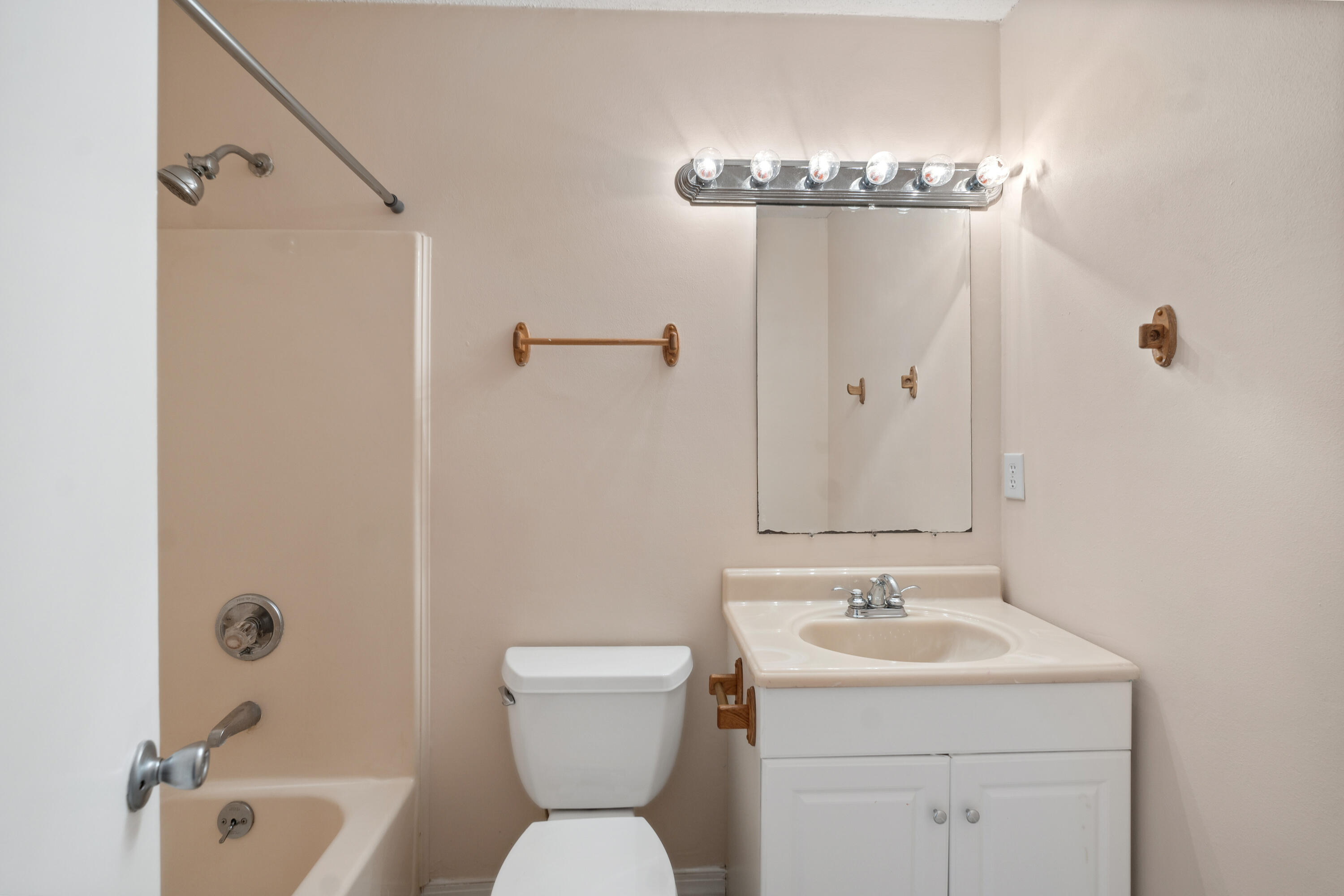 6008 Old Bethel Road Crestview, FL 32536 - Photo 23 of 36 a bathroom with a sink a toilet and shower