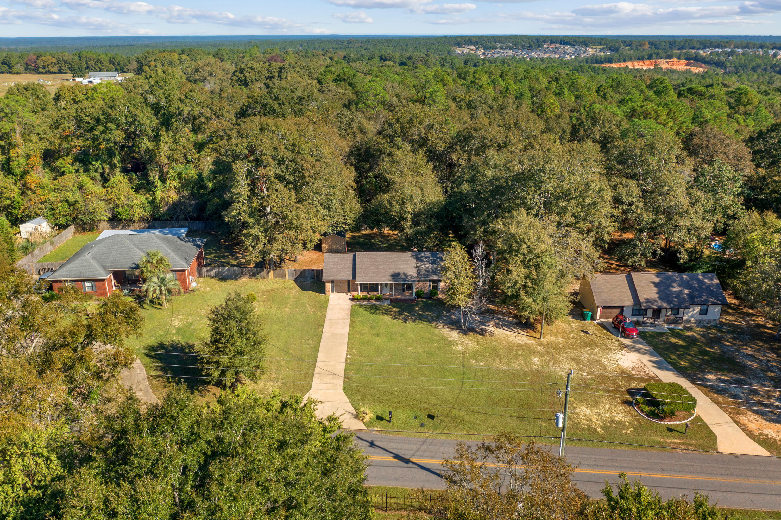 6008 Old Bethel Road Crestview, FL 32536 - Photo 29 of 36 a view of a lake with a house