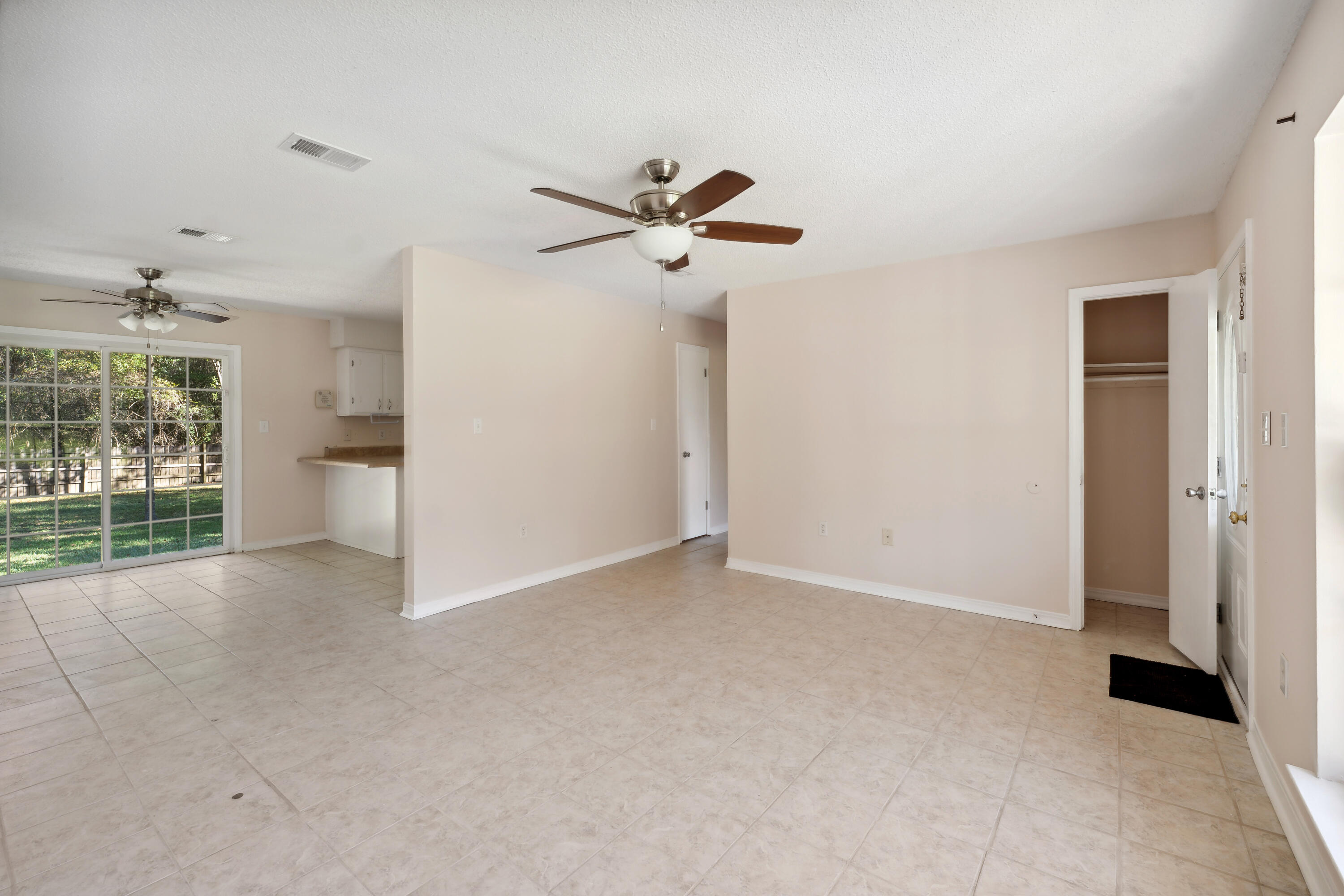 6008 Old Bethel Road Crestview, FL 32536 - Photo 7 of 36 a view of an empty room with a window