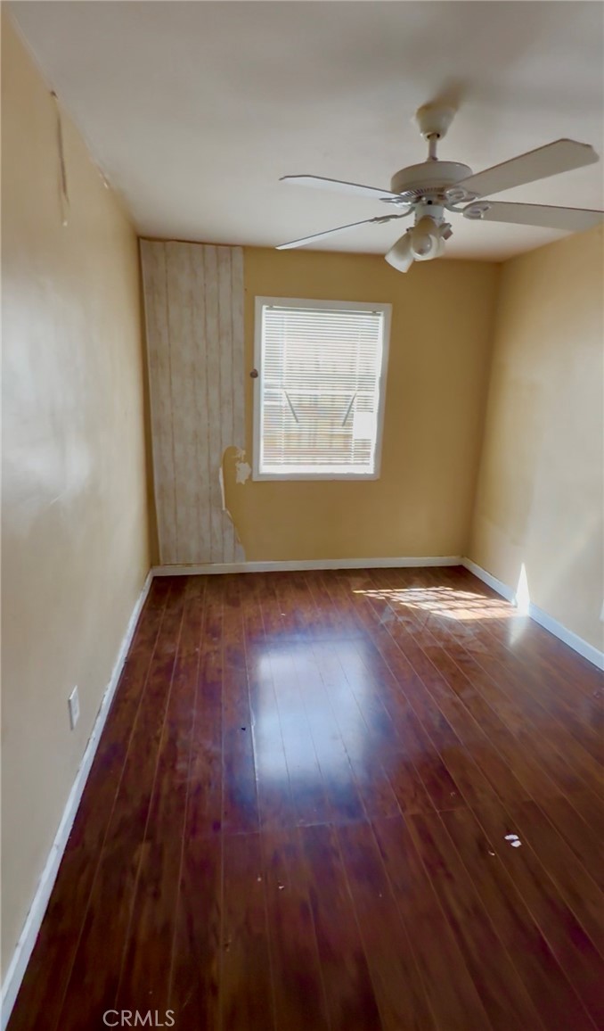 2618 East 124th Street Compton, CA 90222 - Photo 9 of 16 wooden floor in an empty room