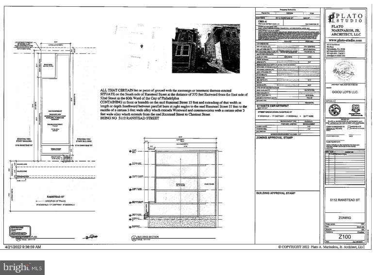 a view of a balcony with a white wall and black white kitchen