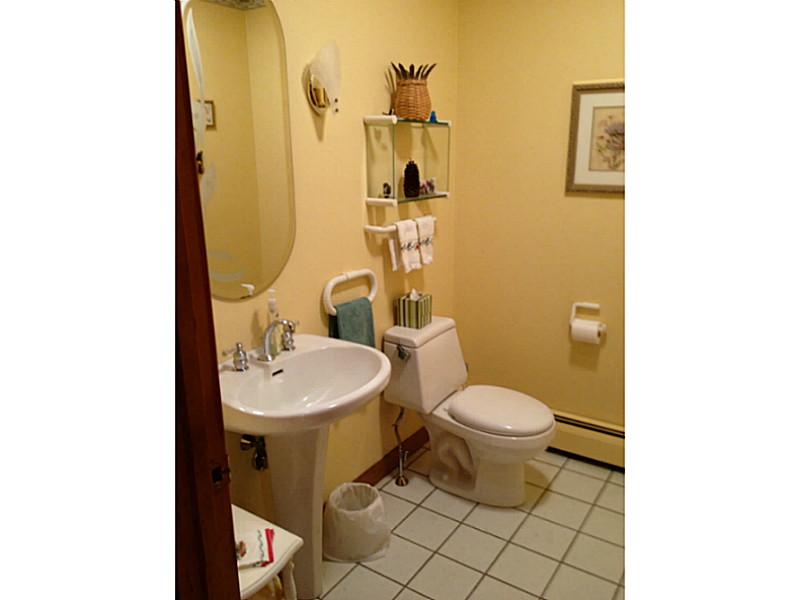280 Tower Hill Road Cumberland, RI 02864 - Photo 20 of 21 Bathroom. Lavette/powder rm enjoys natural light through sky tube!