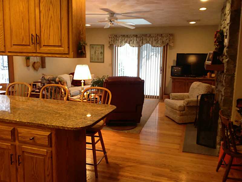 280 Tower Hill Road Cumberland, RI 02864 - Photo 3 of 21 Den/Family/Great Room. View of family room from kitchen. Just look at those oak floors shine!