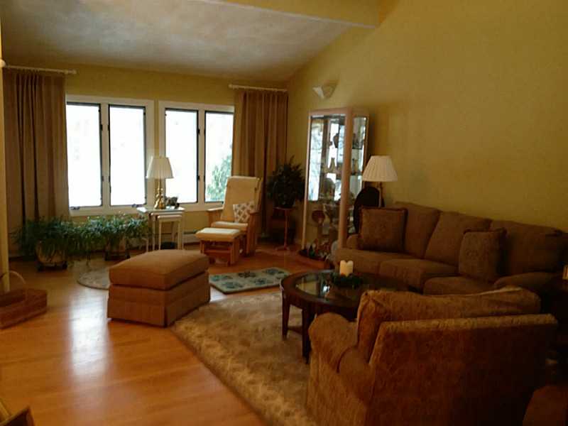 280 Tower Hill Road Cumberland, RI 02864 - Photo 7 of 21 Living Room. Formal living has vaulted ceilings and many windows with a view!