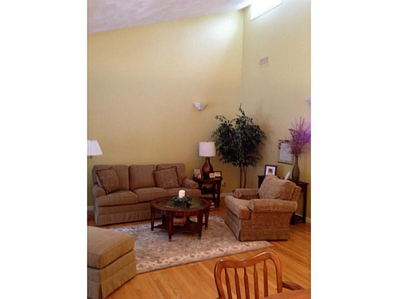 280 Tower Hill Road Cumberland, RI 02864 - Photo 8 of 21 Living Room. Vaulted ceilings, transom windows allow natural light to pour into the living space!
