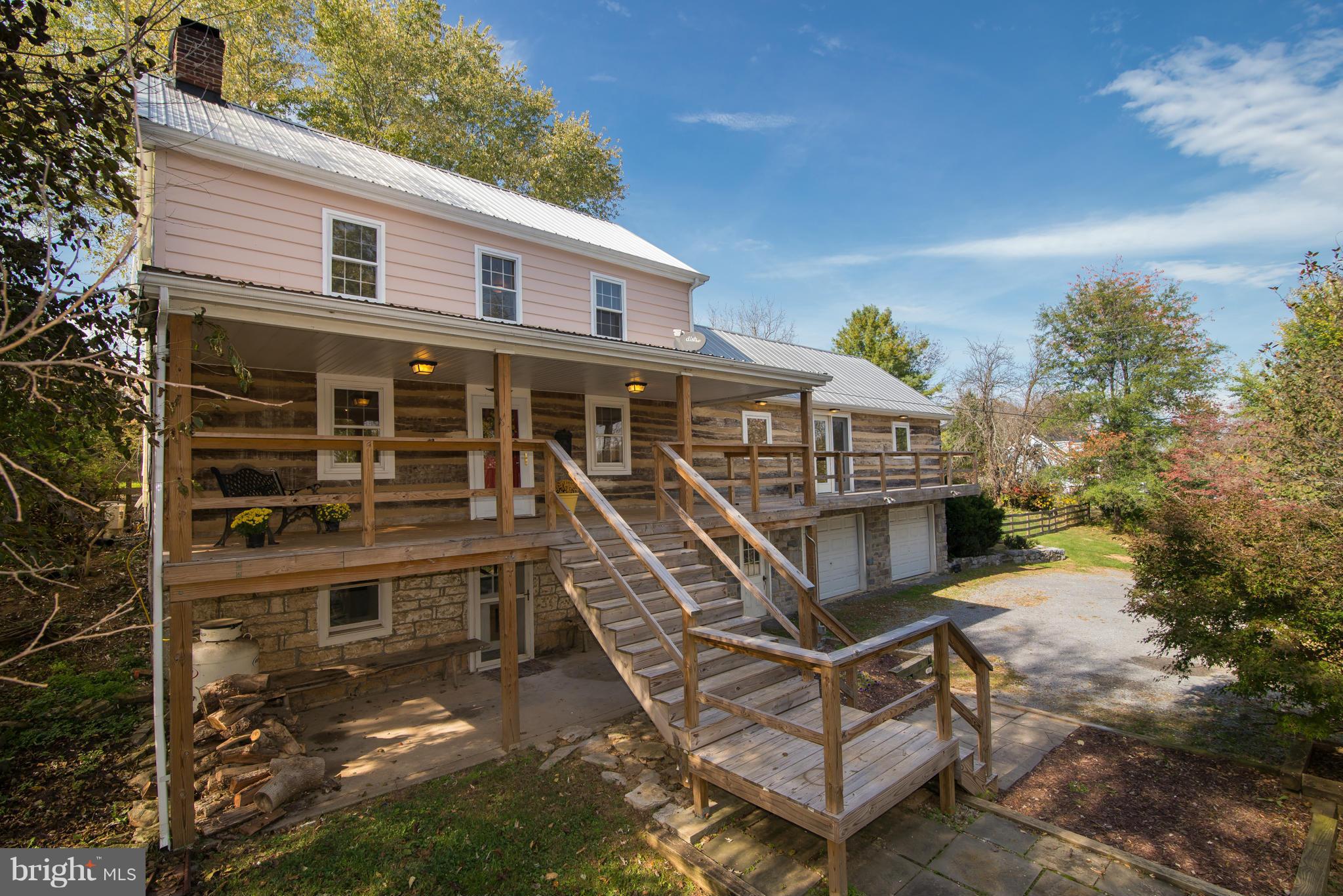 443 Turner Road Shepherdstown, WV 25443 - Photo 1 of 30 a front view of a house with balcony
