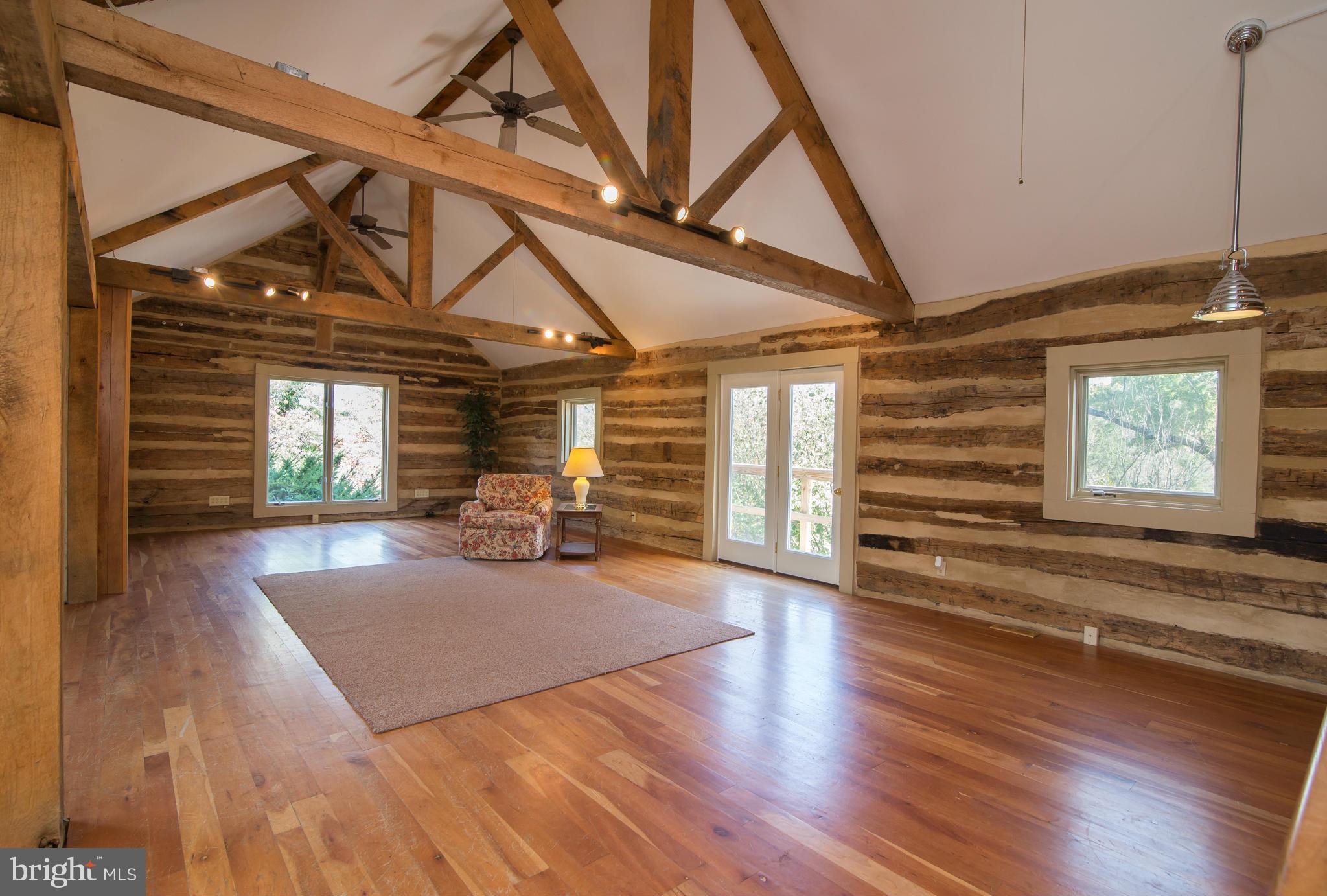 443 Turner Road Shepherdstown, WV 25443 - Photo 10 of 30 a view of a livingroom with wooden floor