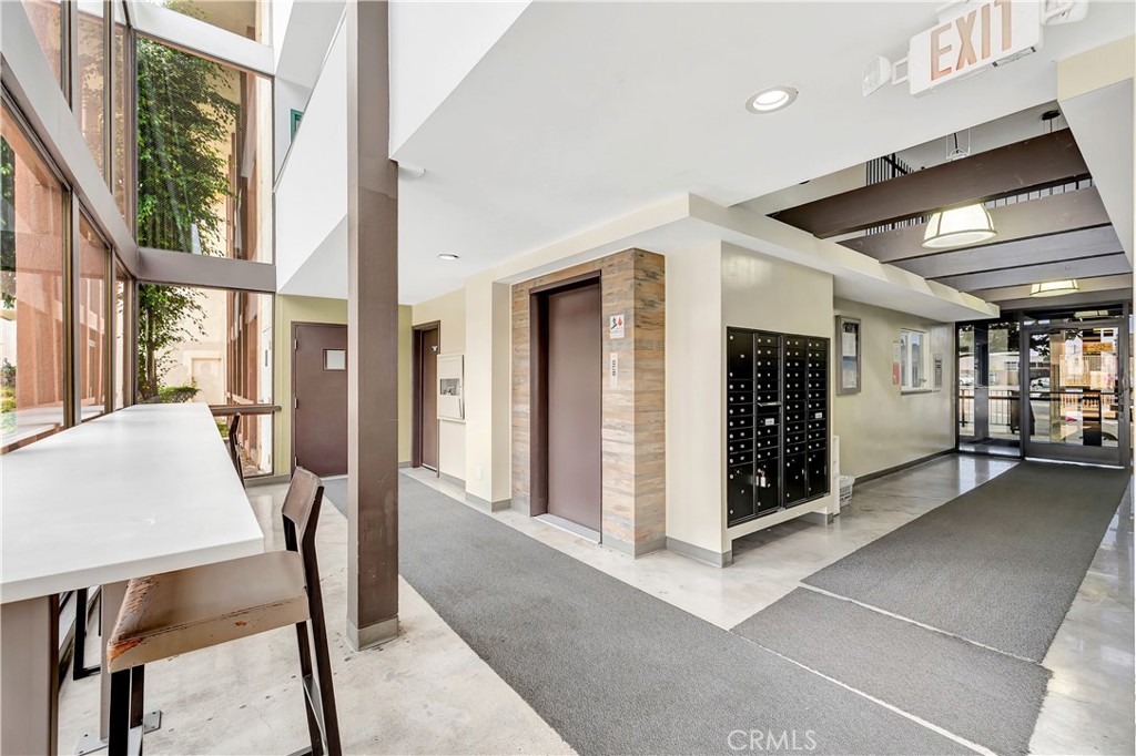 5585 Pacific Coast Highway, Unit 342 Long Beach, CA 90804 - Photo 16 of 32 a view of an entryway with a livingroom