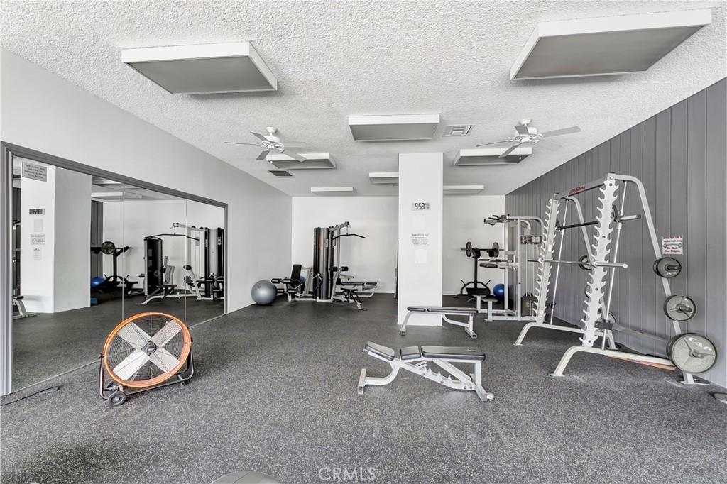 5585 Pacific Coast Highway, Unit 342 Long Beach, CA 90804 - Photo 23 of 32 a view of a room with gym equipment