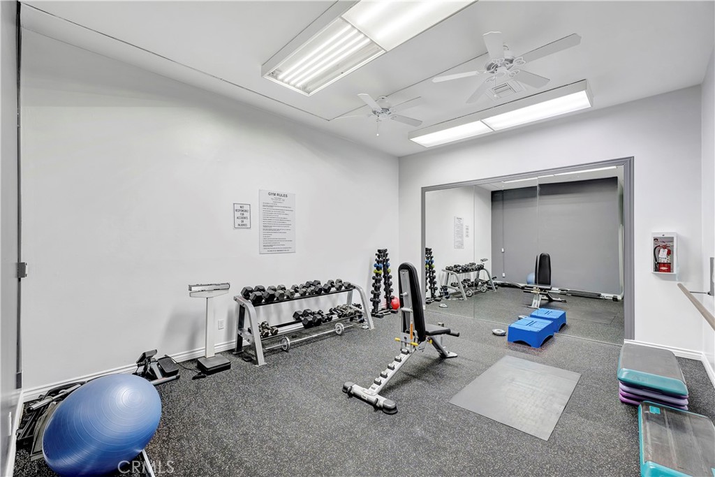 5585 Pacific Coast Highway, Unit 342 Long Beach, CA 90804 - Photo 25 of 32 a view of a room with gym equipment