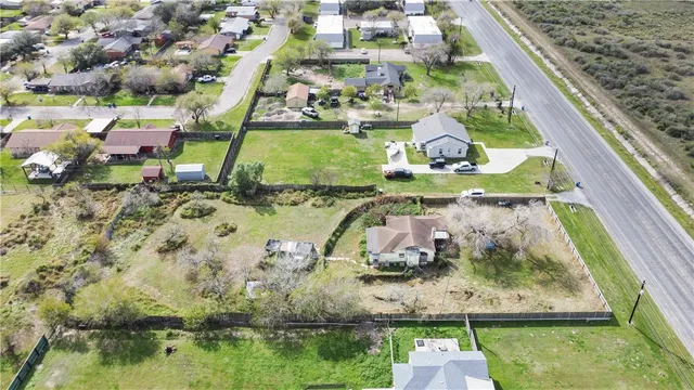 a view of swimming pool with a yard