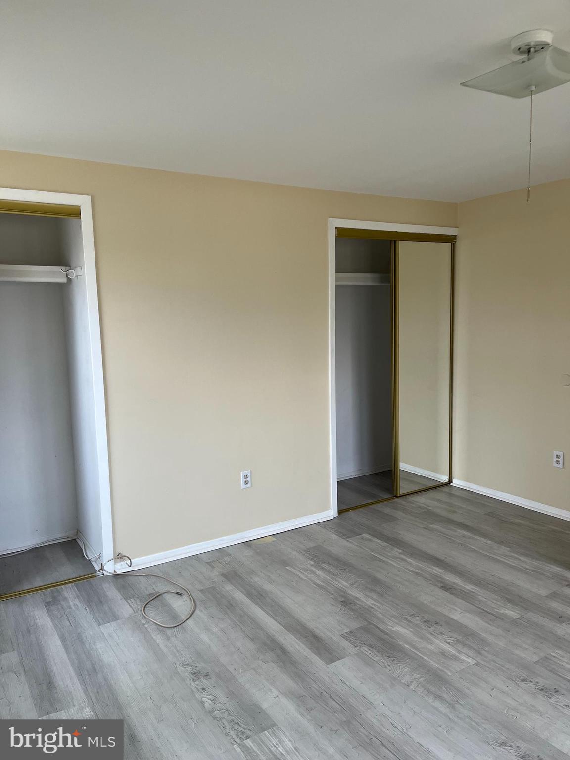42 Genesee Lane Willingboro, NJ 08046 - Photo 15 of 29 an empty room with wooden floor and closet