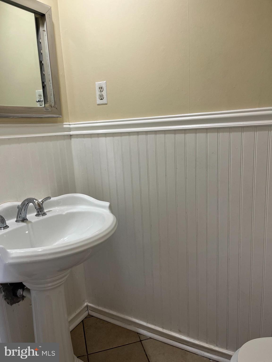 42 Genesee Lane Willingboro, NJ 08046 - Photo 22 of 29 a bathroom with a sink and a mirror