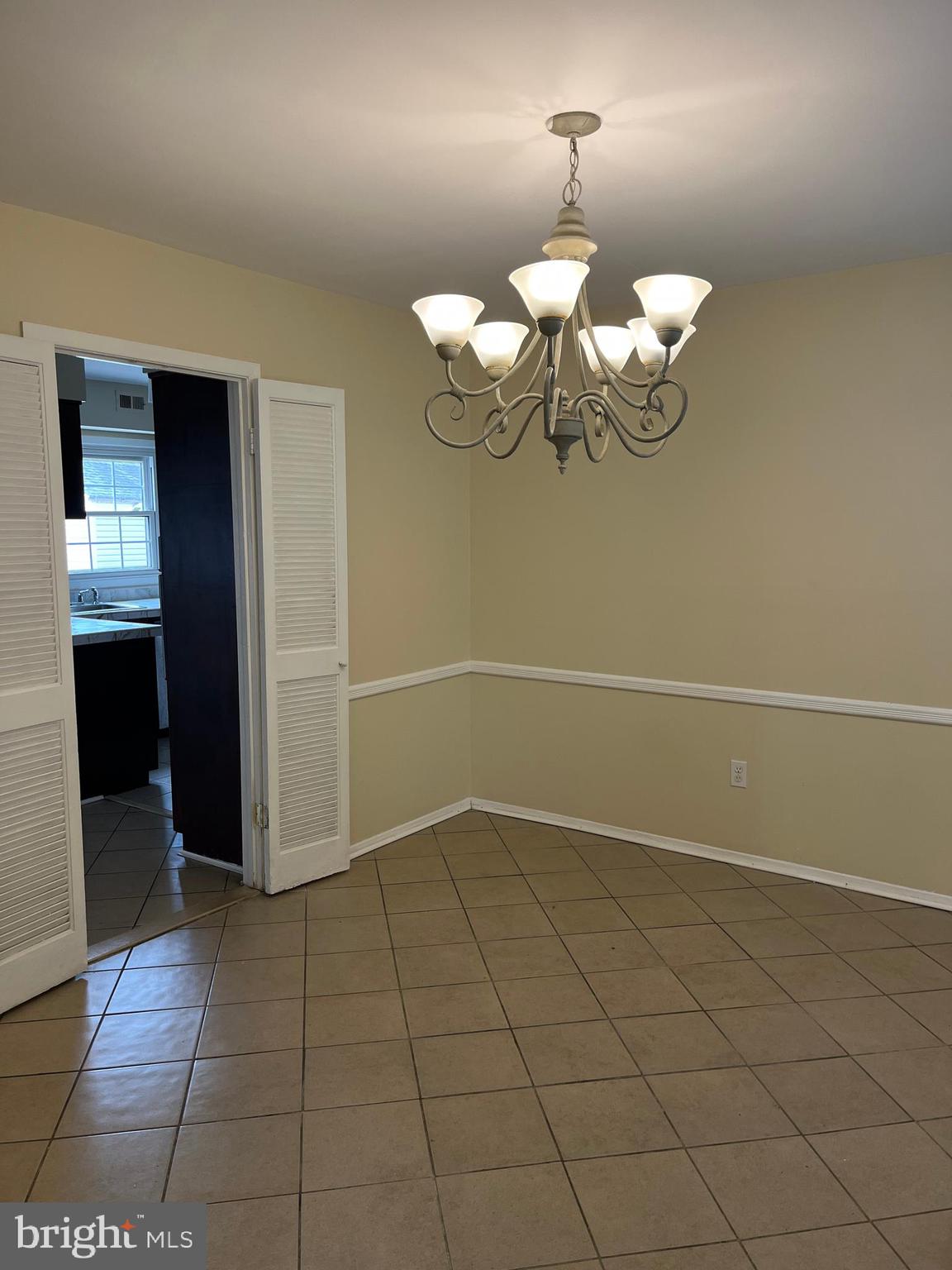 42 Genesee Lane Willingboro, NJ 08046 - Photo 3 of 29 an empty room with chandelier fan