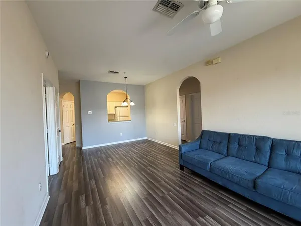 a view of livingroom with furniture and wooden floor