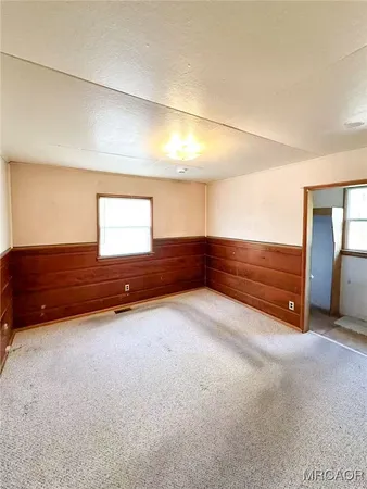 a view of an empty room with window