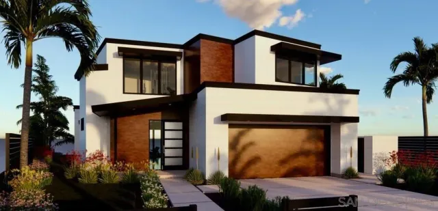 a front view of a house with plants