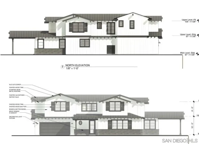 a black and white photo of a white building