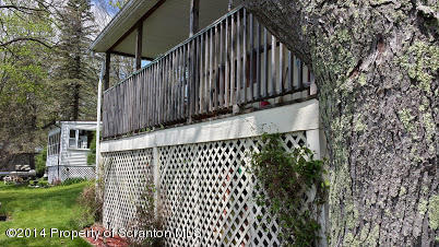 490 State Rte 2005 Springville, PA 18844 - Photo 6 of 24 a view of a backyard with wooden fence