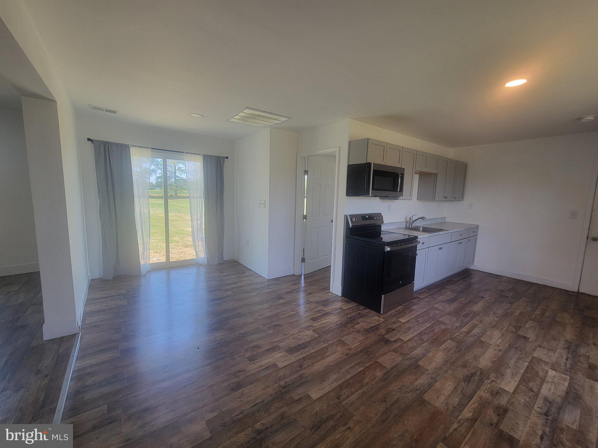 4658 White Marsh Road Madison, MD 21648 - Photo 13 of 25 Bright and airy open living space.