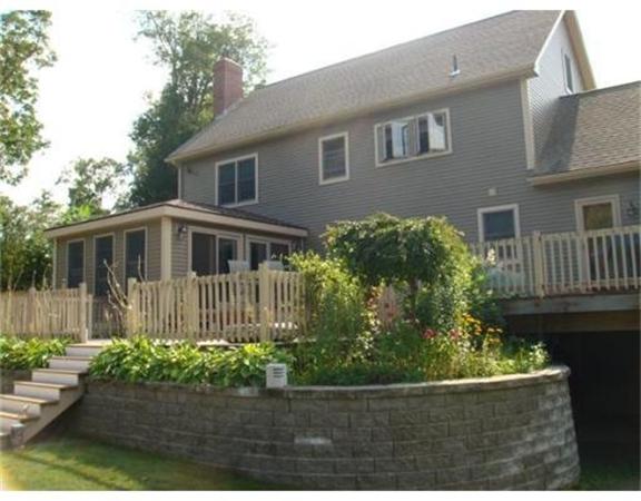 222 Charnock Hill Road Rutland, MA 01543 - Photo 24 of 24 a front view of a house with a garden