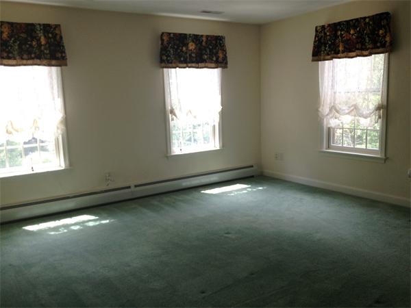222 Charnock Hill Road Rutland, MA 01543 - Photo 10 of 24 a view of an empty room and a window
