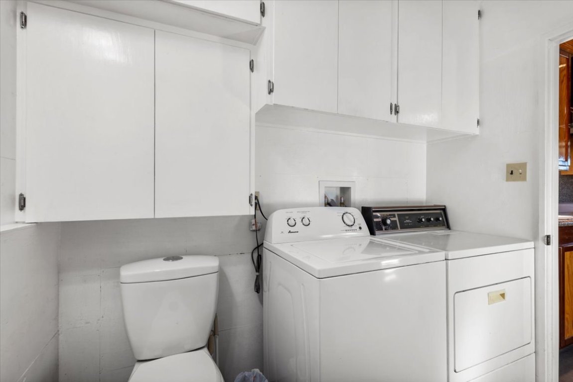 4339 Pettytown Road Dale, TX 78616 - Photo 18 of 33 Laundry room and bathroom with washing machine and clothes dryer