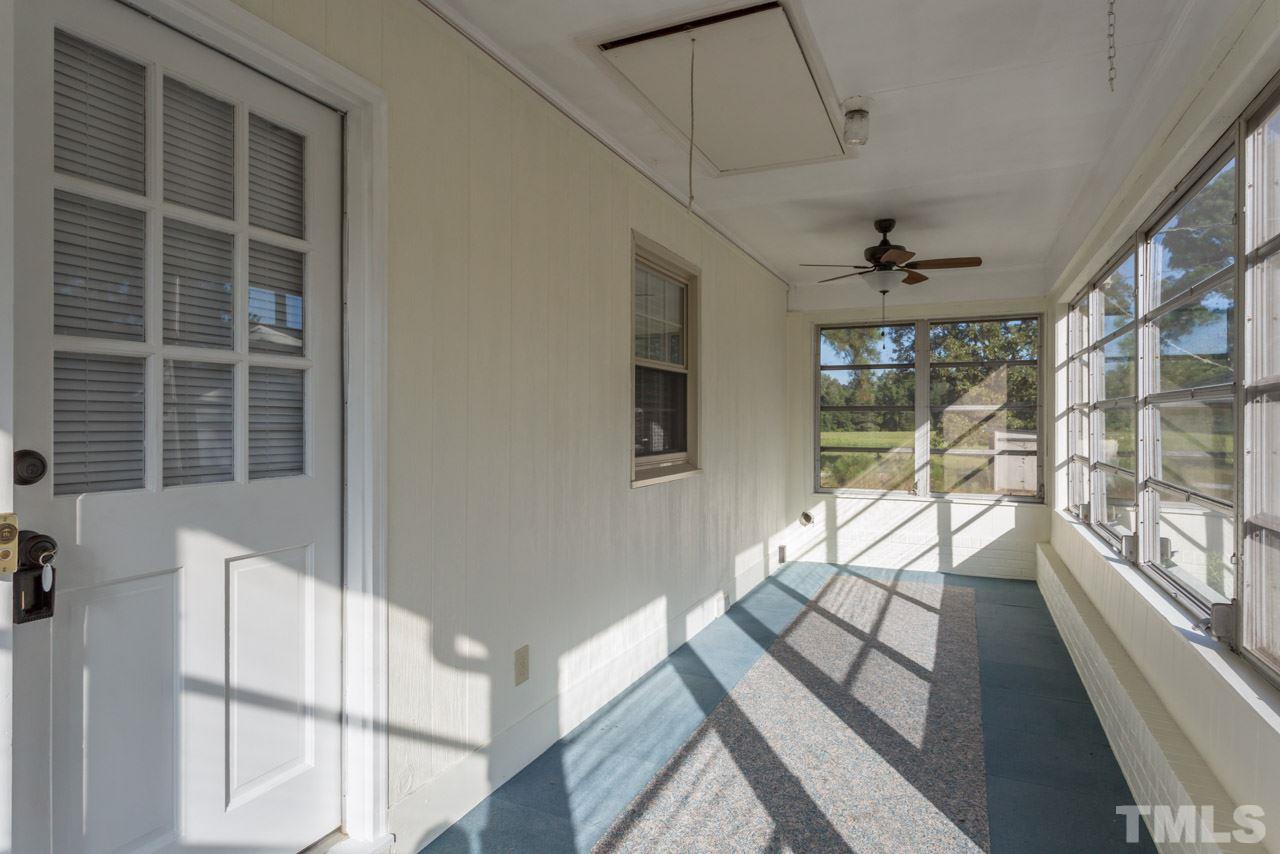 5405 Cheek Road Durham, NC 27704 - Photo 17 of 24 a view of two chairs in the balcony