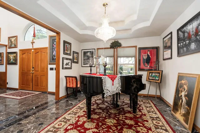a view of a dining room with furniture window and outside view