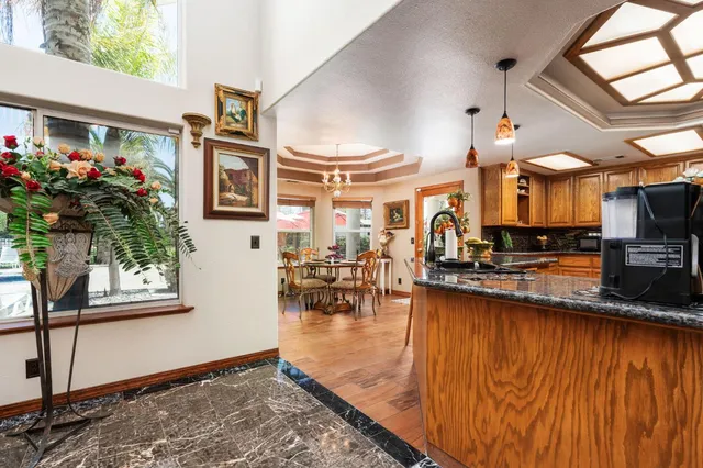 a utility room with sink dryer and washer