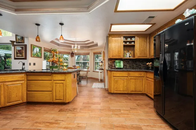 a view of a park with palm trees