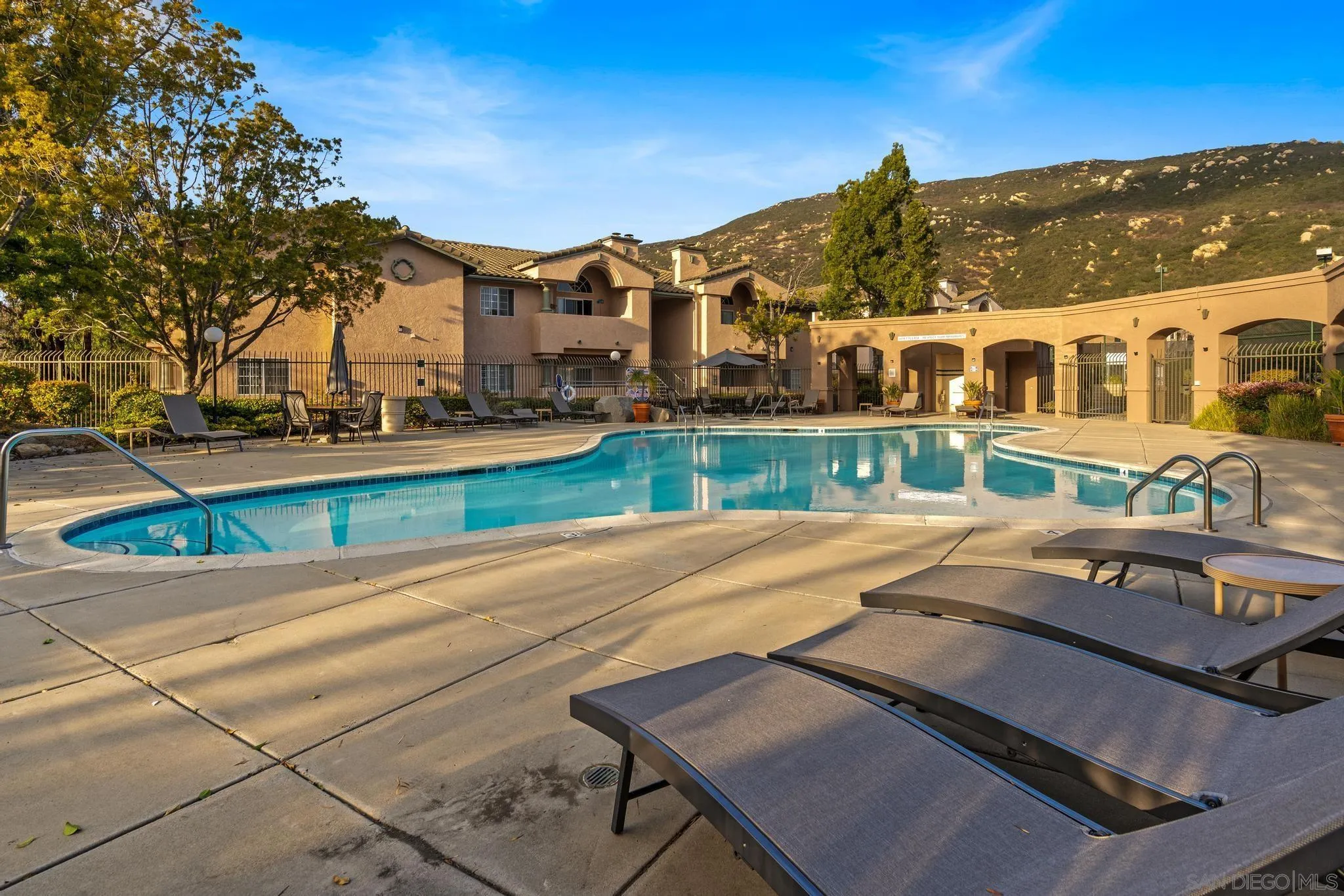 17161 Alva Road, Unit 2128 San Diego, CA 92127 - Photo 8 of 12 a view of a house with a yard