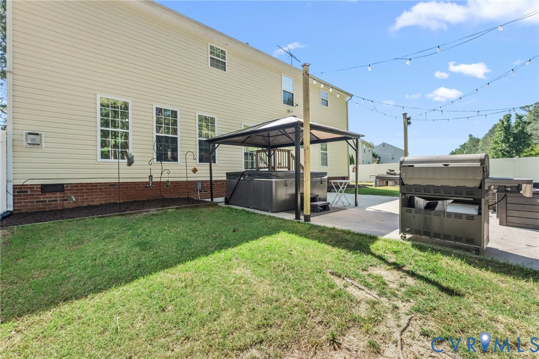 3120 Denise Road Petersburg, VA 23805 - Photo 8 of 51 Expansive patio area featuring a covered hot tub,