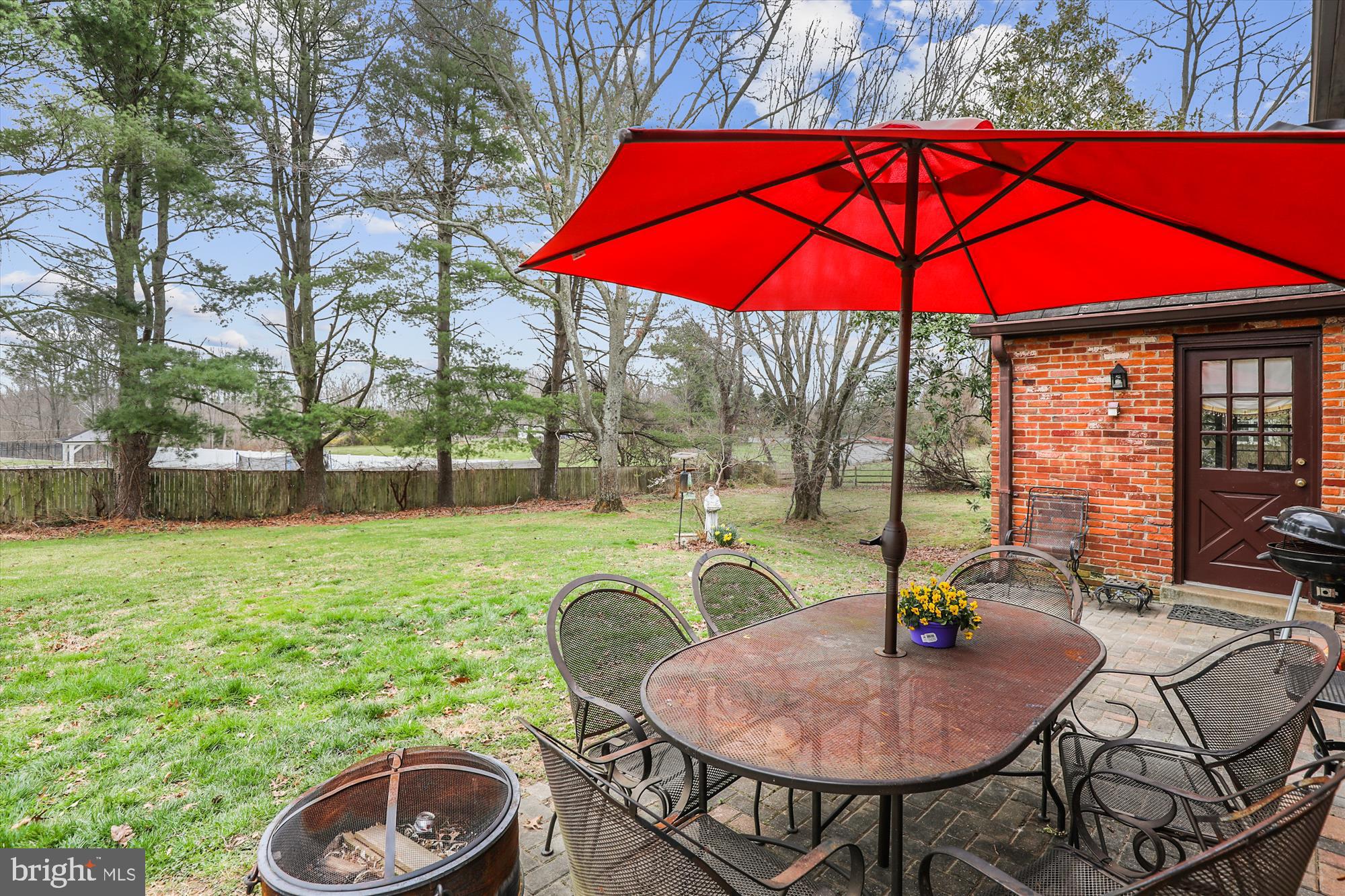 15313 Merrifields Court Silver Spring, MD 20906 - Photo 40 of 46 Patio with view of large yard.